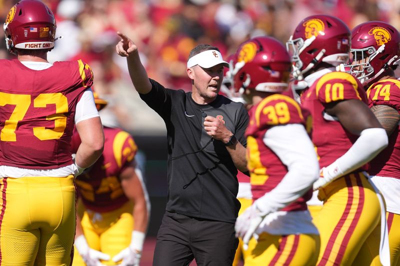 Aug 30, 2025; Los Angeles, California, USA; Southern California Trojans head coach Lincoln Riley gestures during the game against the Missouri State Bears at United Airlines Field at Los Angeles Memorial Coliseum. Mandatory Credit: Kirby Lee-Imagn Images