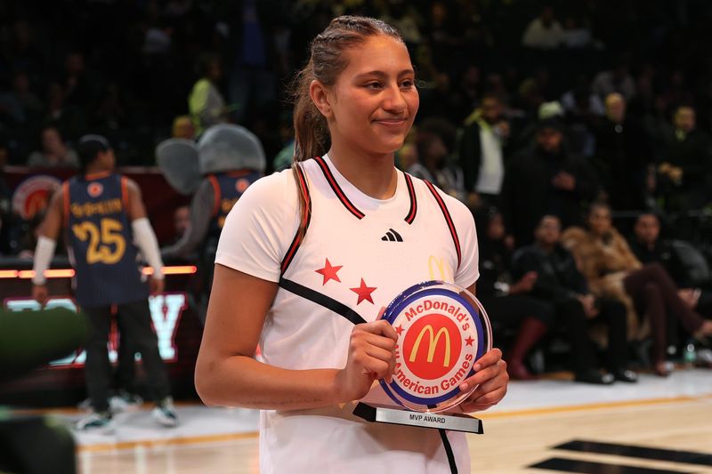 Apr 1, 2025; Brooklyn, NY, USA; McDonald's All American West forward Sienna Betts (51) poses for photos after being named MVP at Barclays Center. Mandatory Credit: Pamela Smith-Imagn Images