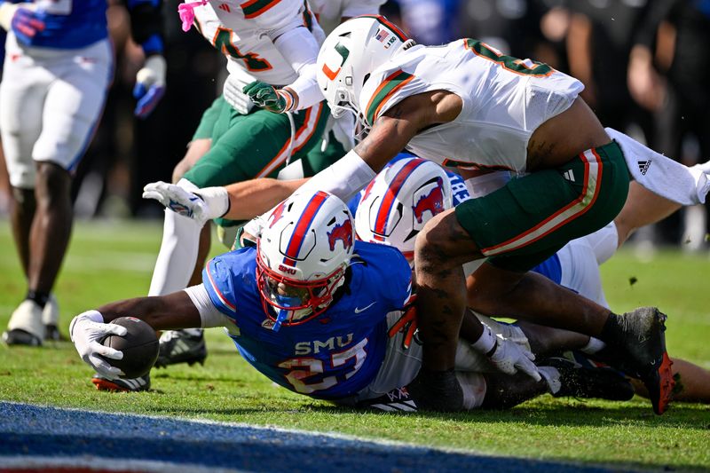 SMU Mustangs running back T.J. Harden (27) dives for the goal line during the overtime period Nov. 1, 2025 against the Miami Hurricanes at Gerald J. Ford Stadium in Dallas, Texas. Mandatory Credit: Jerome Miron-Imagn Images