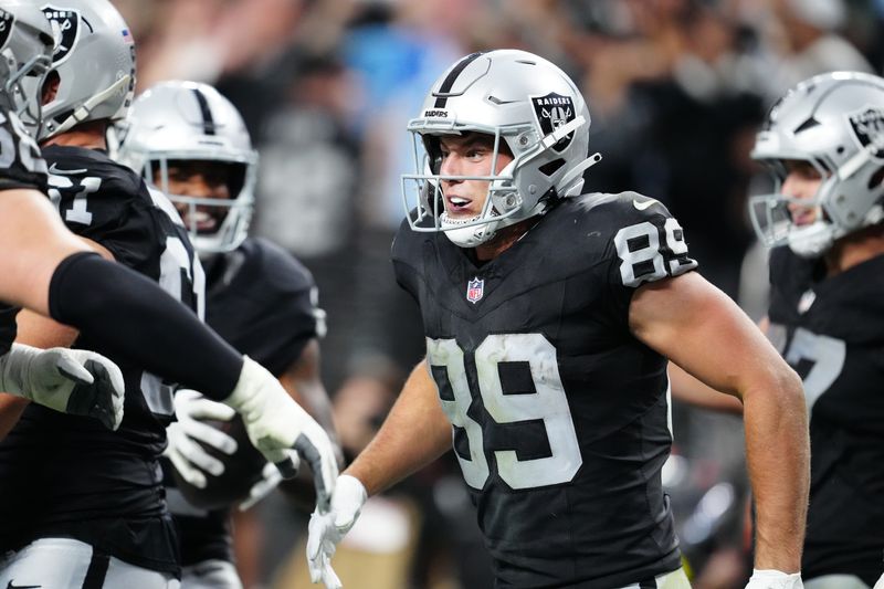 Las Vegas Raiders tight end Brock Bowers (89) celebrates after scoring a touchdown during the second half against the Jacksonville Jaguars at Allegiant Stadium.
