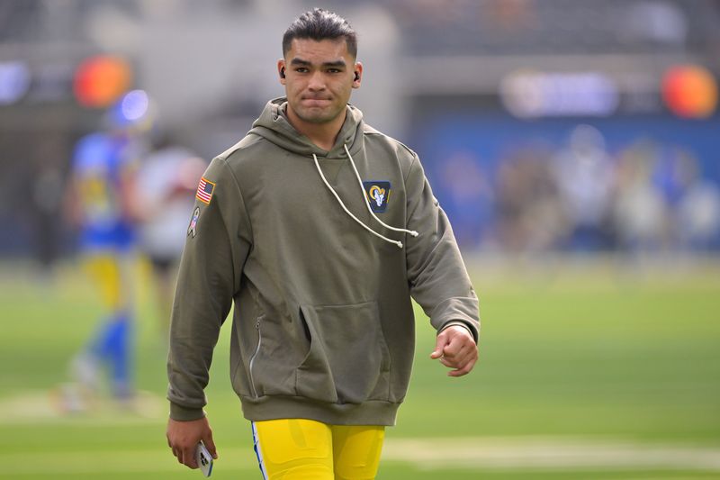 Nov 2, 2025; Inglewood, California, USA; Los Angeles Rams wide receiver Puka Nacua (12) warms up prior to the game against the New Orleans Saints at SoFi Stadium. Mandatory Credit: Jayne Kamin-Oncea-Imagn Images