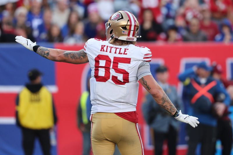 Nov 2, 2025; East Rutherford, New Jersey, USA; San Francisco 49ers tight end George Kittle (85) dances on the field during a break in the action in the second half against the New York Giants at MetLife Stadium. Mandatory Credit: Ed Mulholland-Imagn Images