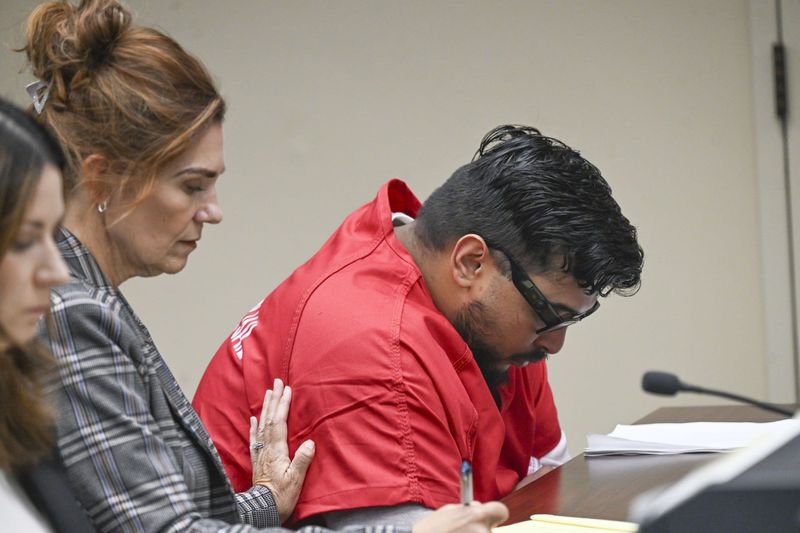 Jake Haro listens Monday as he is sentenced to prison for killing his 7-month-old son, Emmanuel Haro, and lying to police about it.