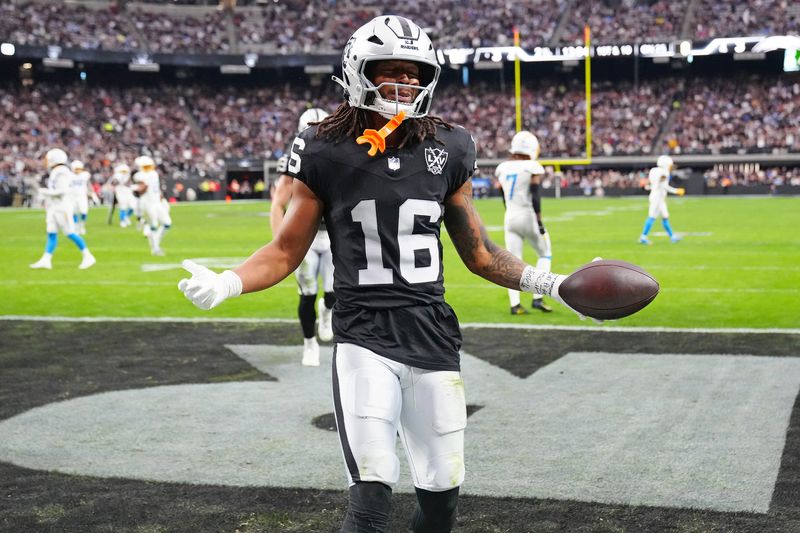 Las Vegas Raiders wide receiver Jakobi Meyers (16) celebrates after scoring a touchdown against the Los Angeles Chargers during the second quarter at Allegiant Stadium in Paradise, Nevada on Jan. 5, 2025.