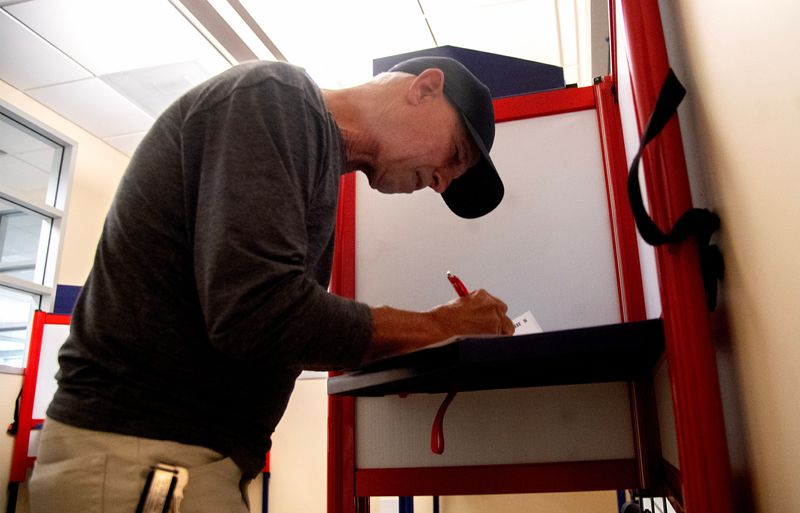 Randy Costa fills out a ballot at the Registrar of Voters office in the San Joaquin County Administration Building in downtown Stockton on Nov. 4. 2025.