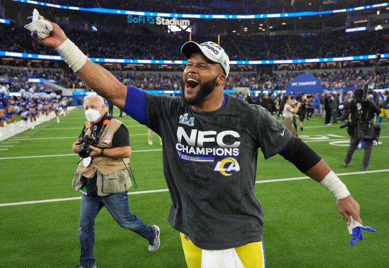 Jan 30, 2022; Inglewood, California, USA; Los Angeles Rams defensive end Aaron Donald celebrates after defeating the San Francisco 49ers in the NFC Championship Game at SoFi Stadium. Mandatory Credit: Kirby Lee-USA TODAY Sports