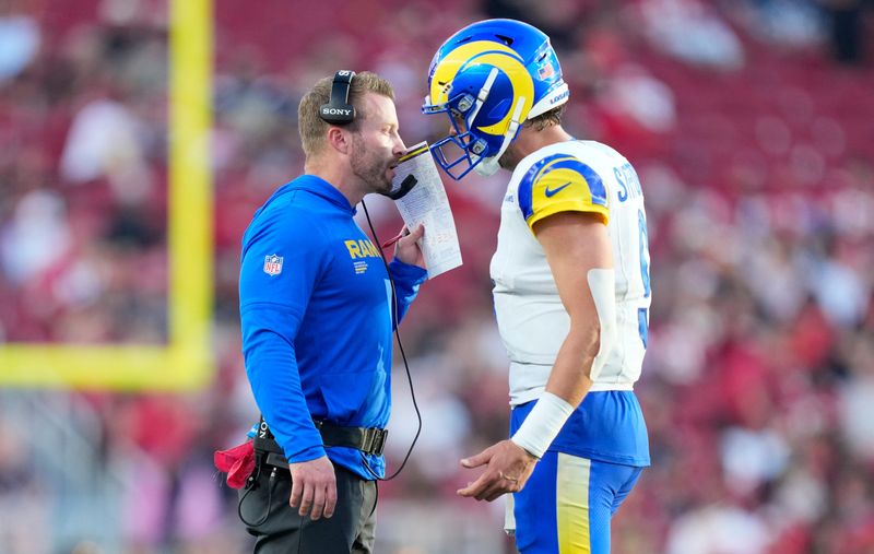 Nov 9, 2025; Santa Clara, California, USA; Los Angeles Rams head coach Sean McVay talks with Los Angeles Rams quarterback Matthew Stafford (9) during the fourth quarter against the San Francisco 49ers at Levi's Stadium. Mandatory Credit: Kyle Terada-Imagn Images