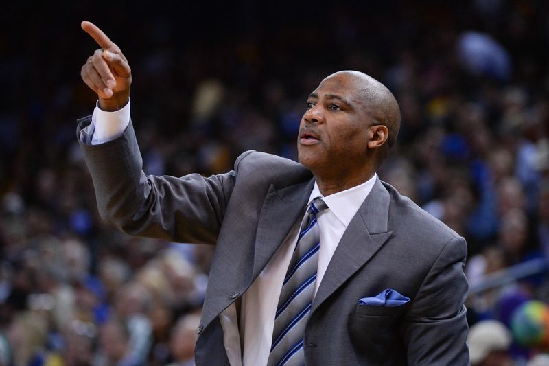 January 15, 2014; Oakland, CA, USA; Denver Nuggets assistant coach Lester Conner instructs during the second quarter against the Golden State Warriors at Oracle Arena. The Nuggets defeated the Warriors 123-116. Mandatory Credit: Kyle Terada-USA TODAY Sports