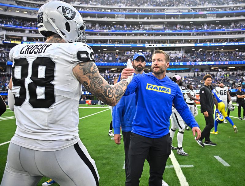 Oct 20, 2024; Inglewood, California, USA; Las Vegas Raiders defensive end Maxx Crosby (98) and Los Angeles Rams head coach Sean McVay after the Rams win at SoFi Stadium. Mandatory Credit: Robert Hanashiro-Imagn Images