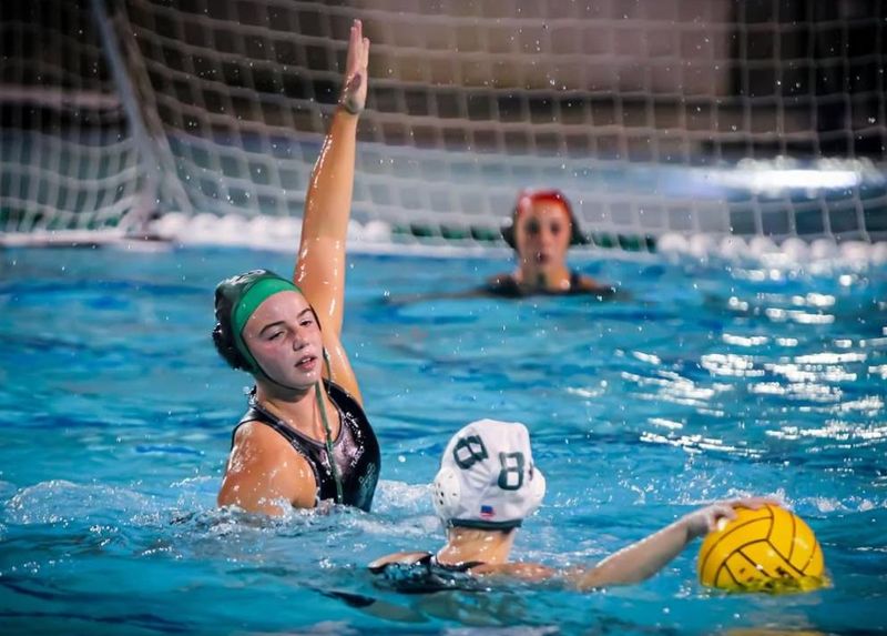 St. Mary’s senior Katherine O’Connor defends a shot during a recent match, getting a hand up to contest the attempt.