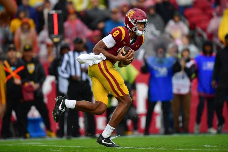 Nov 15, 2025; Los Angeles, California, USA; Southern California Trojans wide receiver Ja'Kobi Lane (8) catches a pass against the Iowa Hawkeyes during the first half at the Los Angeles Memorial Coliseum. Mandatory Credit: Gary A. Vasquez-Imagn Images
