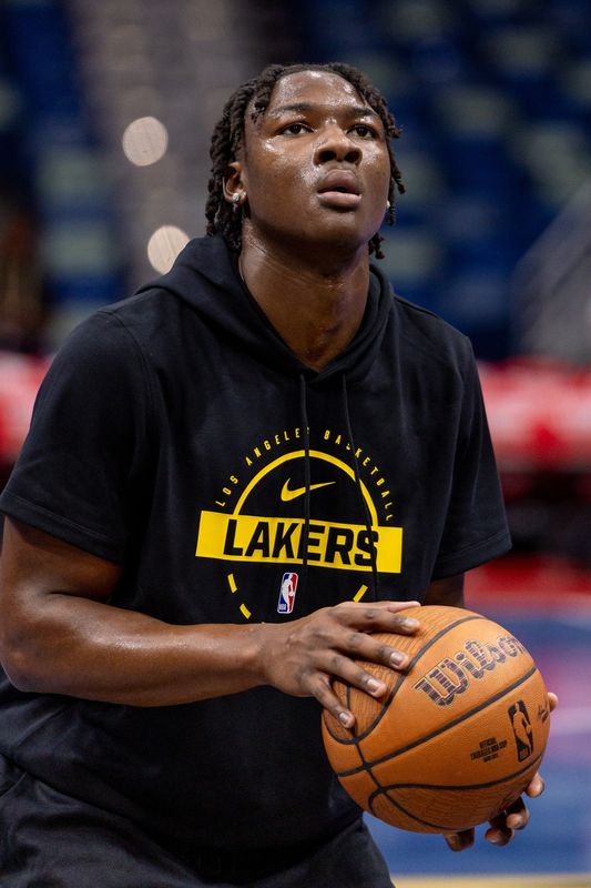 Nov 14, 2025; New Orleans, Louisiana, USA; Los Angeles Lakers guard Adou Thiero (1) warms up before the game against the New Orleans Pelicans at Smoothie King Center. Mandatory Credit: Stephen Lew-Imagn Images