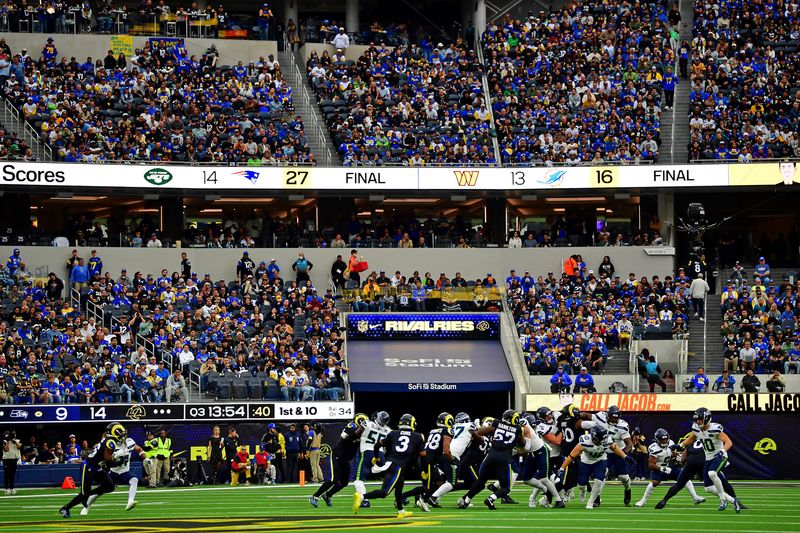 Nov 16, 2025; Inglewood, California, USA; Seattle Seahawks running back Kenneth Walker III (9) runs the ball during the second half against the Los Angeles Rams at SoFi Stadium. Mandatory Credit: Gary A. Vasquez-Imagn Images