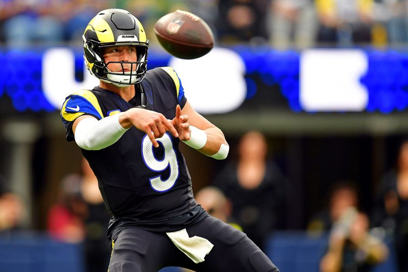 Nov 16, 2025; Inglewood, California, USA; Los Angeles Rams quarterback Matthew Stafford (9) throws a pass during the first half against the Seattle Seahawks at SoFi Stadium. Mandatory Credit: Gary A. Vasquez-Imagn Images
