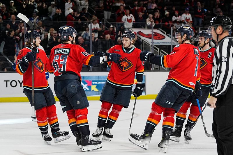 Firebirds celebrate a second period goal by Firebirds forward Jacob Melanson (63) against the Abbottsford Canucks at Acrisure Arena in Palm Desert, Calif., on Sunday, Nov. 16, 2025.