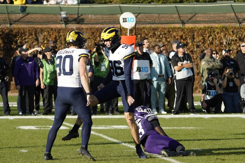 Nov 15, 2025; Chicago, Illinois, USA; Michigan Wolverines kicker Dominic Zvada (96) celebrates the game winning field goal against the Northwestern Wildcats during the second half at Wrigley Field. Mandatory Credit: David Banks-Imagn Images