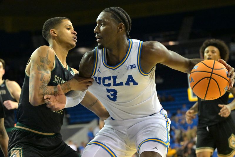 Nov 18, 2025; Los Angeles, California, USA; Sacramento State Hornets forward Shaqir O'Neal (8) defends UCLA Bruins forward Eric Dailey Jr. (3) during the second half at Pauley Pavilion presented by Wescom Financial. Mandatory Credit: Jayne Kamin-Oncea-Imagn Images