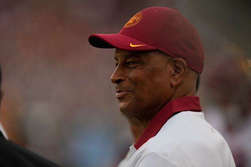 Sep 10, 2022; Stanford, California, USA; Retired San Francisco 49ers safety Ronnie Lott smiles on the sidelines during the third quarter of the game between Stanford Cardinal and USC Trojans at Stanford Stadium. Mandatory Credit: Stan Szeto-USA TODAY Sports