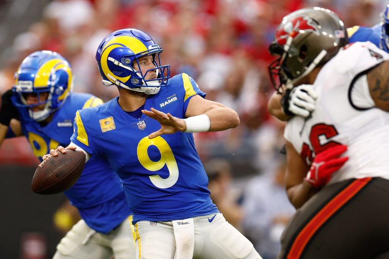 Nov 6, 2022; Tampa, Florida, USA; Los Angeles Rams quarterback Matthew Stafford (9) looks to pass the ball against the Tampa Bay Buccaneers during the first quarter at Raymond James Stadium. Mandatory Credit: Douglas DeFelice-USA TODAY Sports