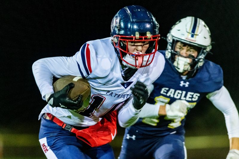 Hesperia Christian’s Jackson Lake turns a pass reception into a big gain against Lancaster Baptist during CIF-SS 8-Man Division 2 semifinals on Friday, Nov. 21, 2025. Lancaster Baptist won 45-22.