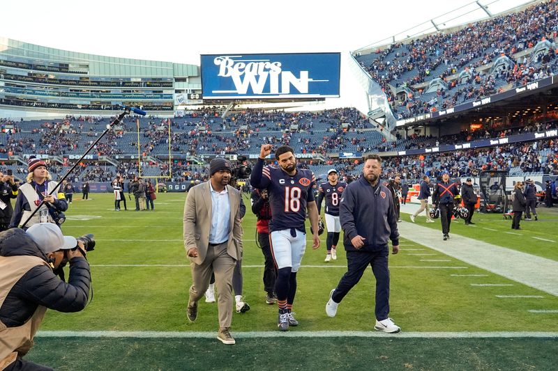 Nov 23, 2025; Chicago, Illinois, USA; Chicago Bears quarterback Caleb Williams (18) leaves the field following the game against the Pittsburgh Steelers at Soldier Field. Mandatory Credit: David Banks-Imagn Images