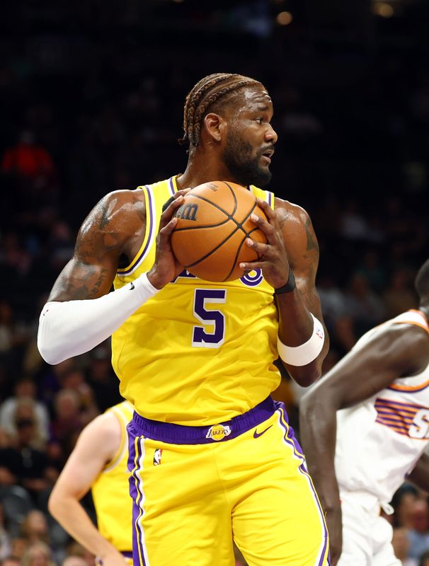 Oct 14, 2025; Phoenix, Arizona, USA; Los Angeles Lakers center Deandre Ayton (5) against the Phoenix Suns during an NBA preseason game at Mortgage Matchup Center. Mandatory Credit: Mark J. Rebilas-Imagn Images
