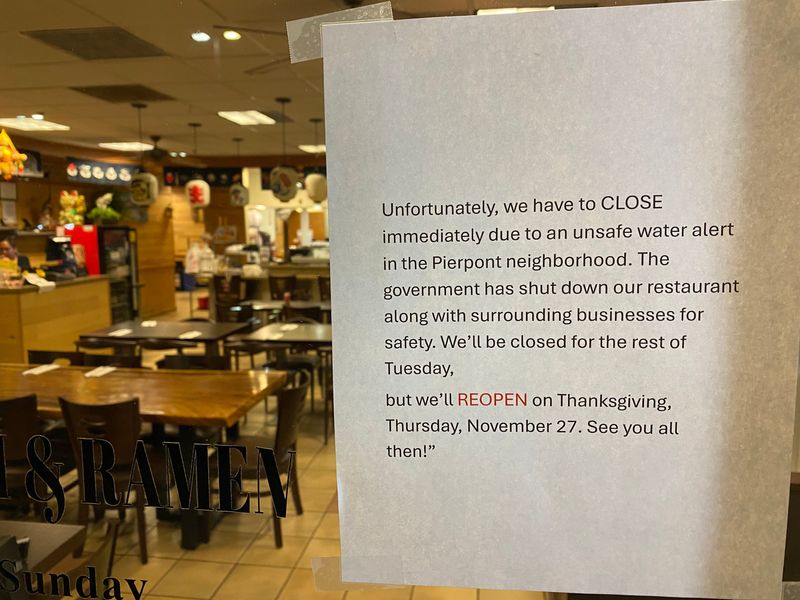 A sign at Lucky Sushi & Ramen off Ventura's Harbor Boulevard on Nov. 25, 2025, expresses confidence the business will be open on Thanksgiving.