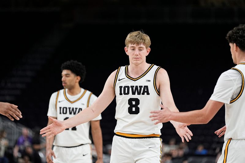 Iowa guard Cooper Koch (8) prepares to shoot a free throw during the second half against Ole Miss during the Acrisure Series at Acrisure Arena in Palm Desert, Calif., on Nov. 25, 2025. Iowa won 74-69.
