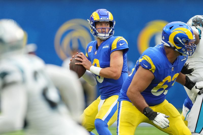 Oct 16, 2022; Inglewood, California, USA; Los Angeles Rams quarterback Matthew Stafford (9) throws the ball in the second half against the Carolina Panthers at SoFi Stadium. Mandatory Credit: Kirby Lee-USA TODAY Sports
