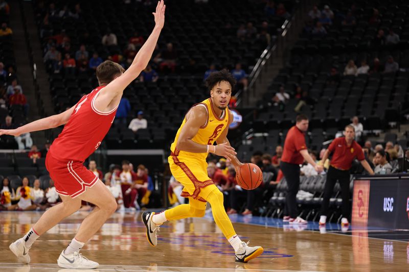 Nov 14, 2025; Inglewood, California, USA; Southern California Trojans forward Terrance Williams II (5) dribbles the ball against Illinois State Redbirds guard Landon Wolf (4) during the first half of the Hall of Fame Series game at Intuit Dome. Mandatory Credit: Kiyoshi Mio-Imagn Images