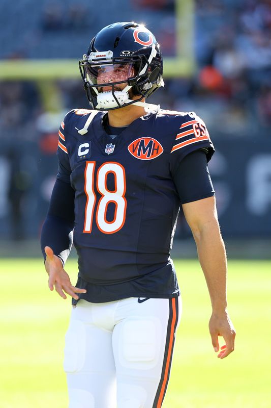Nov 23, 2025; Chicago, Illinois, USA; Chicago Bears quarterback Caleb Williams (18) practices before the game against the Pittsburgh Steelers at Soldier Field. Mandatory Credit: Mike Dinovo-Imagn Images
