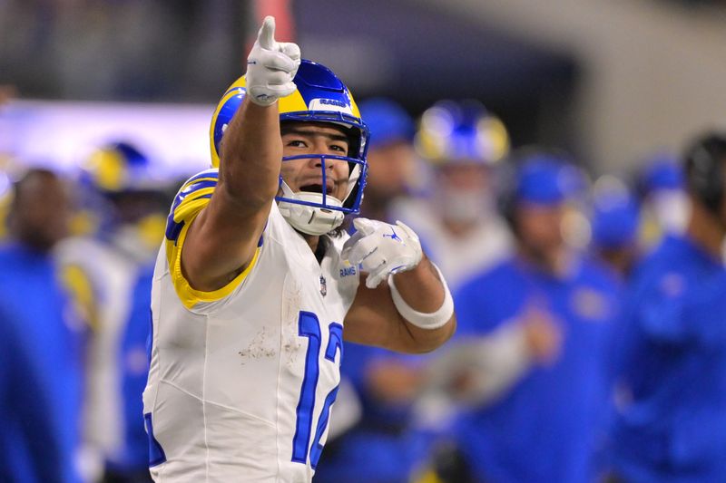 Nov 23, 2025; Inglewood, California, USA; Los Angeles Rams wide receiver Puka Nacua (12) reacts after a first down against the Tampa Bay Buccaneers at SoFi Stadium. Mandatory Credit: Jayne Kamin-Oncea-Imagn Images