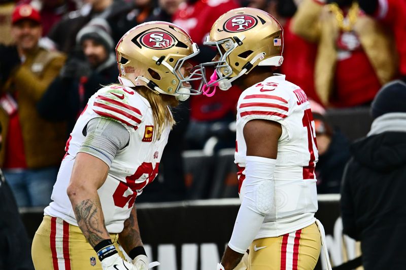 Nov 30, 2025; Cleveland, Ohio, USA; San Francisco 49ers tight end George Kittle (85) celebrates with wide receiver Jauan Jennings (15) after Jennings caught a touchdown during the fourth quarter against the Cleveland Browns at Huntington Bank Field. Mandatory Credit: Ken Blaze-Imagn Images