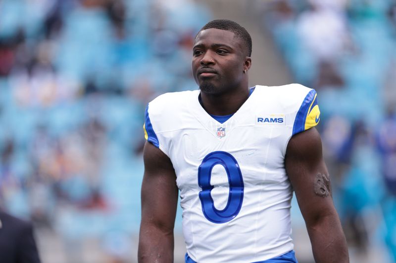 Nov 30, 2025; Charlotte, North Carolina, USA; Los Angeles Rams linebacker Byron Young (0) looks on before the game against the Carolina Panthers at Bank of America Stadium. Mandatory Credit: Scott Kinser-Imagn Images