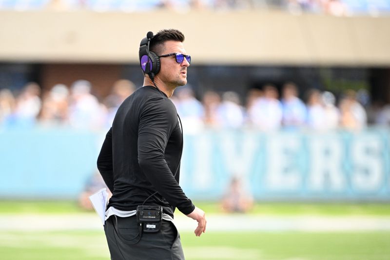 Sep 21, 2024; Chapel Hill, North Carolina, USA; James Madison Dukes head coach Bob Chesney on the sidelines in the second quarter at Kenan Memorial Stadium. Mandatory Credit: Bob Donnan-Imagn Images