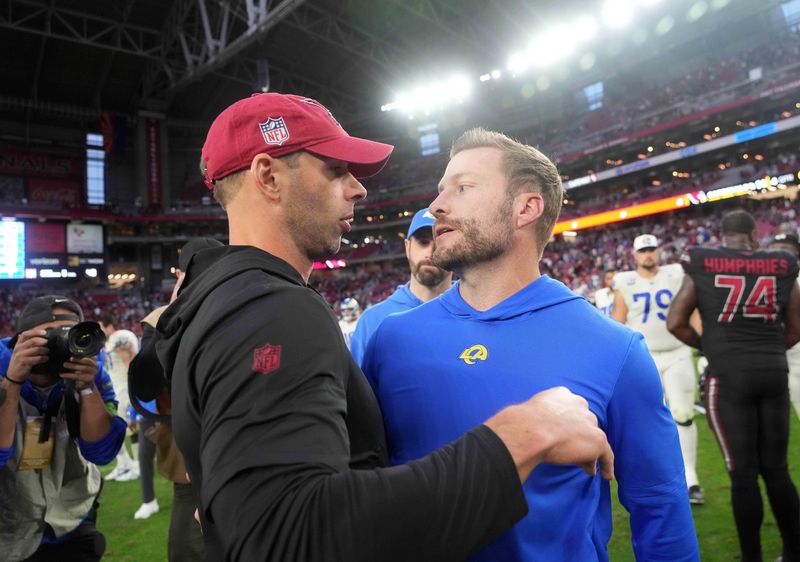 Nov 26, 2023; Glendale, Arizona, USA; Arizona Cardinals head coach Jonathan Gannon and Los Angeles Rams head coach Sean McVay shake hands after their game at at State Farm Stadium. Mandatory Credit: Joe Camporeale-USA TODAY Sports
