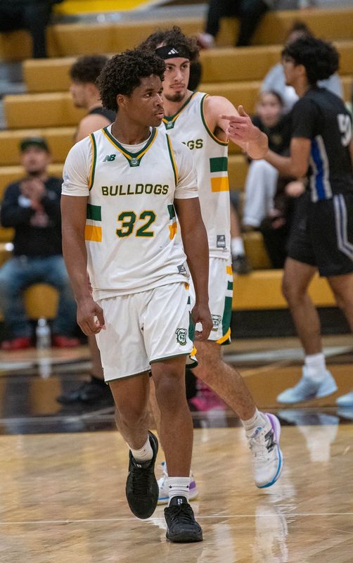 Tracy High’s Maximillian Russell stares at the crowd after making a three in the championship game of the Stagg Tourney at Stagg High School in Stockton Saturday December 6, 2025. Mountain House won 78-61.
