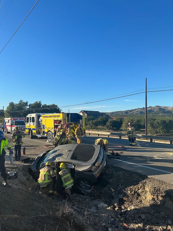 Ventura County Fire crews remove the driver from a single-vehicle crash into ditch on State Route 118 in Somis Dec. 7. The man was airlifted to the hospital with moderate injuries.