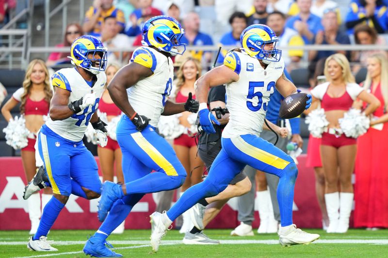 Dec 7, 2025; Glendale, Arizona, USA; Los Angeles Rams linebacker Nate Landman (53) reacts after an interception during the second half at State Farm Stadium. Mandatory Credit: Joe Camporeale-Imagn Images