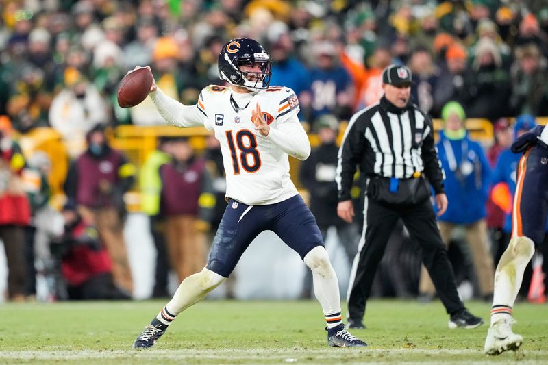 Dec 7, 2025; Green Bay, Wisconsin, USA; Chicago Bears quarterback Caleb Williams (18) throws in the third quarter against the Green Bay Packers at Lambeau Field. Mandatory Credit: Jeff Hanisch-Imagn Images