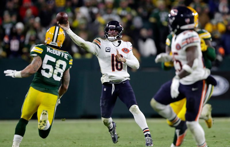 Chicago Bears quarterback Caleb Williams (18) passes the ball during a football game against the Green Bay Packers on Dec. 7, 2025, at Lambeau Field in Green Bay, Wis. The Packers defeated the Bears 28-21.