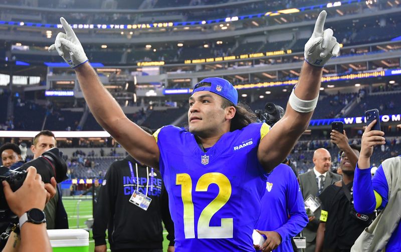 Dec 14, 2025; Inglewood, California, USA; Los Angeles Rams wide receiver Puka Nacua (12) celebrates after defeating the Detroit Lions at SoFi Stadium. Mandatory Credit: Gary A. Vasquez-Imagn Images