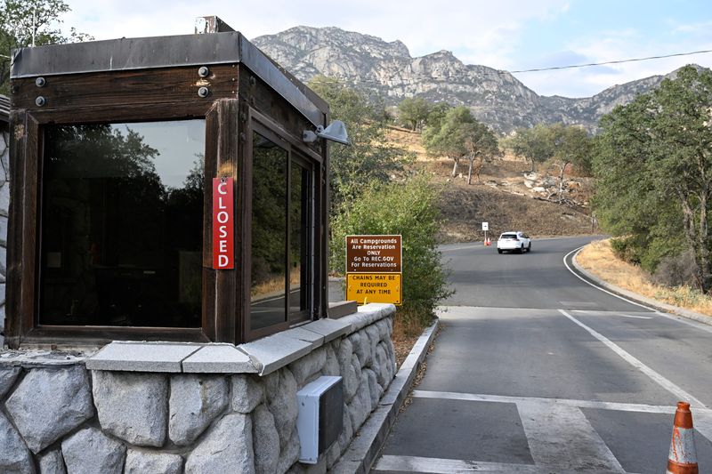 Motorists pass by the entrance station to Sequoia National Park on Thursday, October 2, 2025.