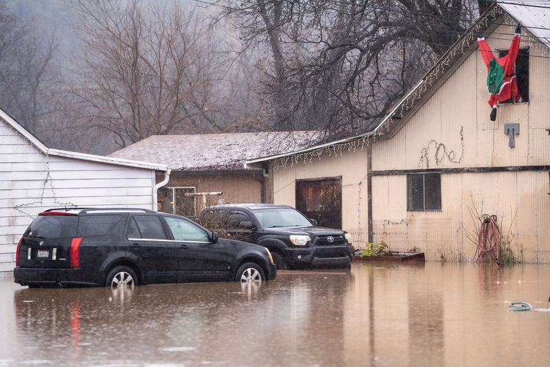 A flooded yard is shown Monday, Dec. 22, 2025 at a house at 2190 Branstetter Lane.