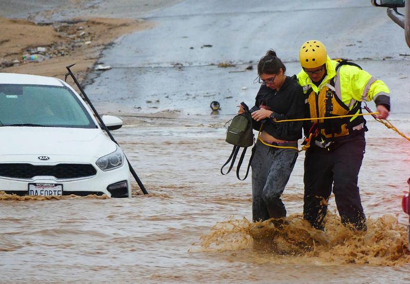 During the Christmas Eve storm, the San Bernardino County Fire Department responded to many water rescues, including one near the corner of Talisman and Valencia streets in Hesperia.