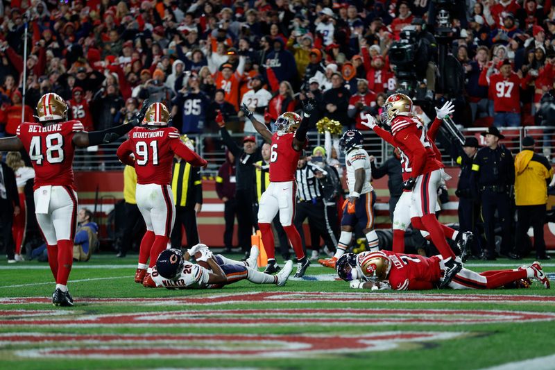 Dec 28, 2025; Santa Clara, California, USA; San Francisco 49ers defense celebrates after defeating the Chicago Bears at Levi's Stadium. Mandatory Credit: Sergio Estrada-Imagn Images