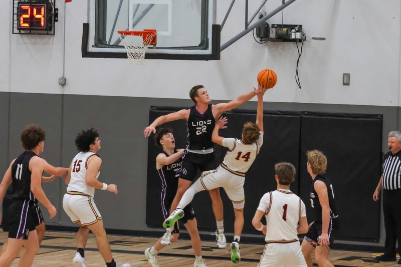 Redding Christian standout Darren Goodman blocks a West Valley shot at the Jamie Angley Classic. Redding Christian beat the Eagles in a 69-33 blowout and Goodman scored 23 points. Dec. 30, 2025.