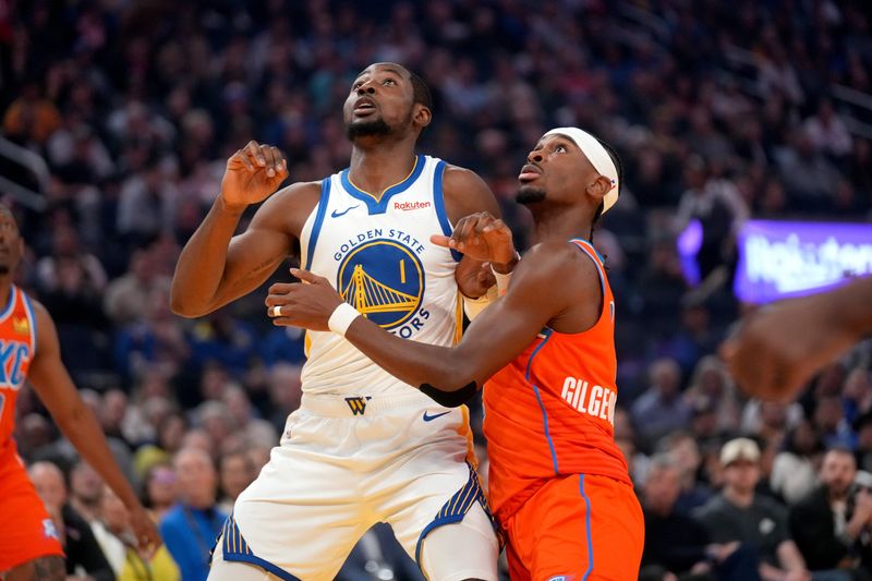 Dec 2, 2025; San Francisco, California, USA; Golden State Warriors forward Jonathan Kuminga (1) and Oklahoma City Thunder guard Shai Gilgeous-Alexander (2) battle for position in the first quarter at the Chase Center. Mandatory Credit: Cary Edmondson-Imagn Images