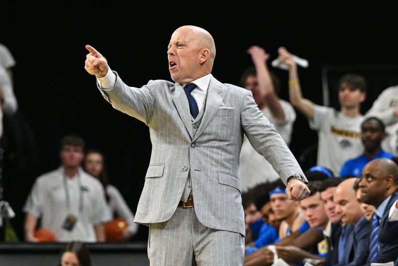 Jan 3, 2026; Iowa City, Iowa, USA; UCLA Bruins head coach Mick Cronin reacts during the first half against the Iowa Hawkeyes at Carver-Hawkeye Arena. Mandatory Credit: Jeffrey Becker-Imagn Images