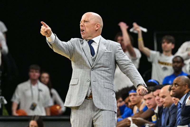 Jan 3, 2026; Iowa City, Iowa, USA; UCLA Bruins head coach Mick Cronin reacts during the first half against the Iowa Hawkeyes at Carver-Hawkeye Arena. Mandatory Credit: Jeffrey Becker-Imagn Images